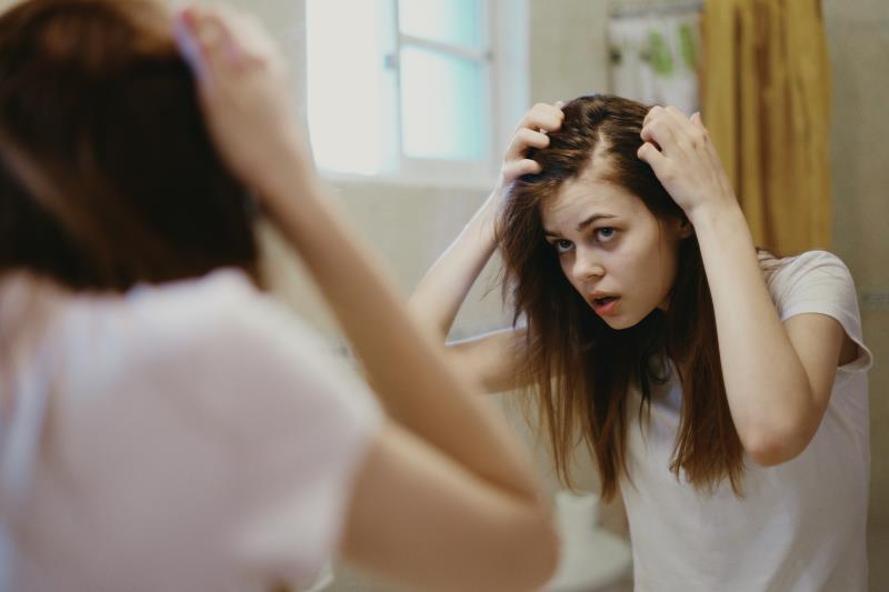 Is spironolactone combined with low-dose minoxidil safe for hair loss in women?