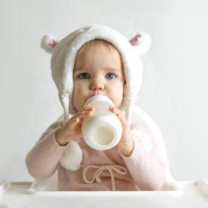 Is whole goat milk formula protective against AD in infants?